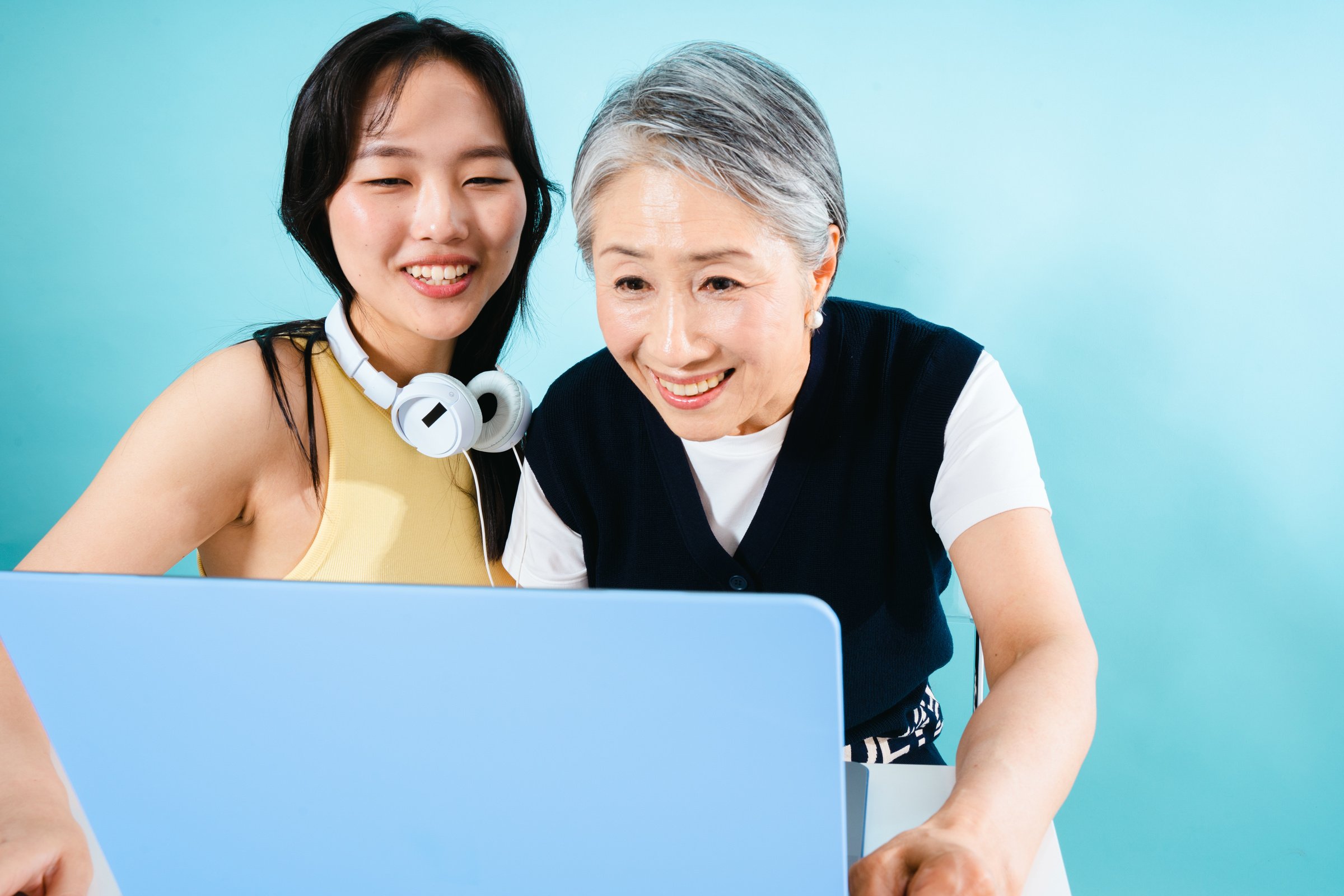 High Flash Casual Tech Older and Younger Woman Using Laptop